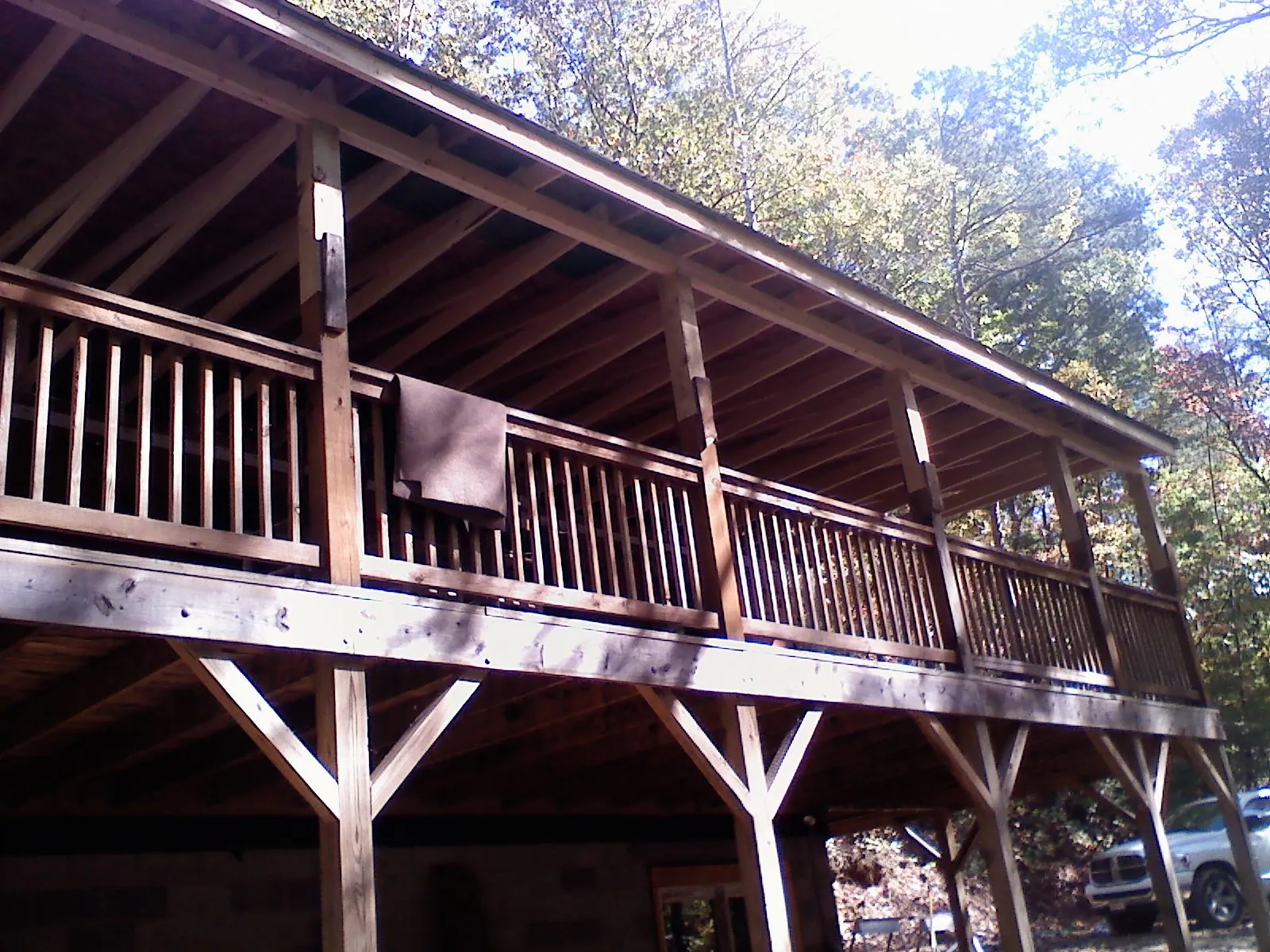 Timber framing under a new elevated porch and deck — Roof Leak Repair in Millington by Roofing Brothers